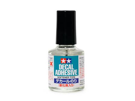 ADHESIVO PARA CALCAS, ELIMINA EL BRILLO DEL SOPORTE (10 ml)